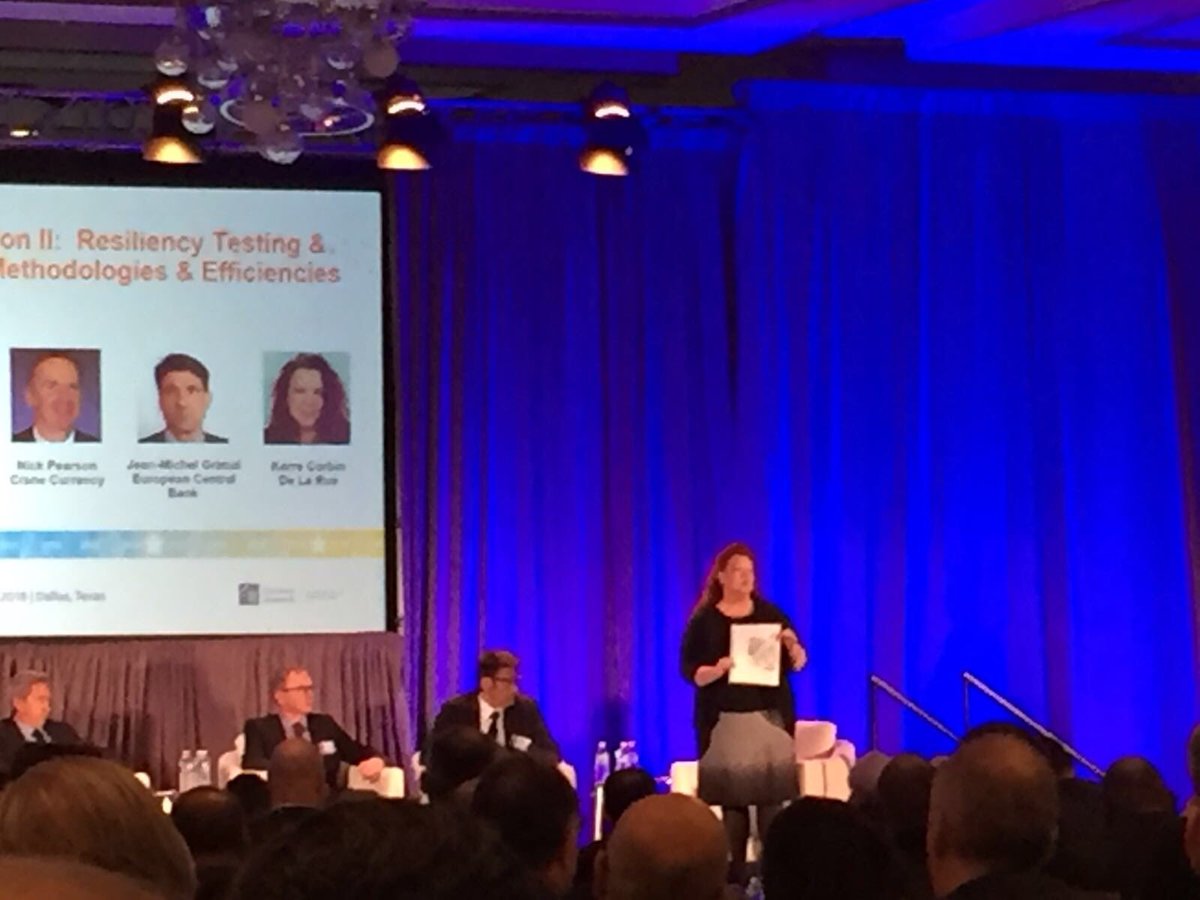 DeLaRuePlc's tweet image. Kerre Corbin, Counterfeit Analyst, showing the audience some of De La Rue’s adversarial analysis #BanknoteConference2018