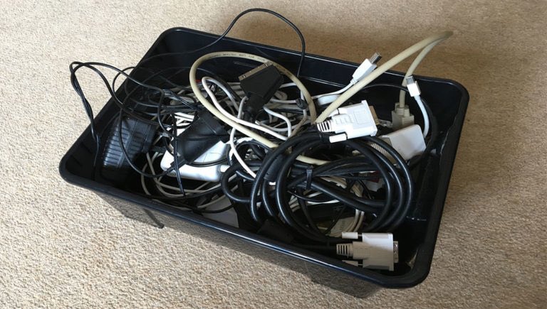 PainPoint's tweet photo. Breaking News: A man decides to keep a box of cables he’s had since 2002 for another year. https://t.co/hgA2OfKw6T
