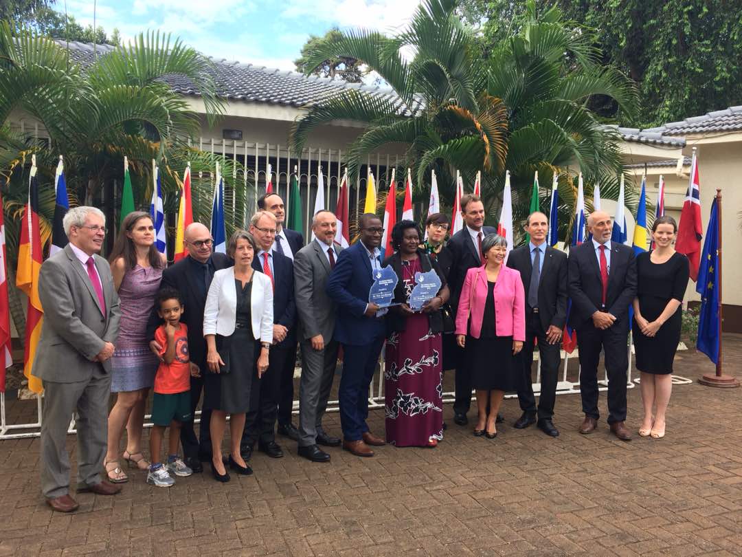 EUinUG's tweet photo. The Heads of Mission of the EU Member States, the EU Delegation and Norway are pleased to announce Ms Margaret Arach Orech and Mr Peter Sewakiryanga as winners of the EU Human Rights Defenders Award 2018. The awards event was hosted today under the auspices of @BelgiumInUganda https://t.co/9lwcyCWFPL