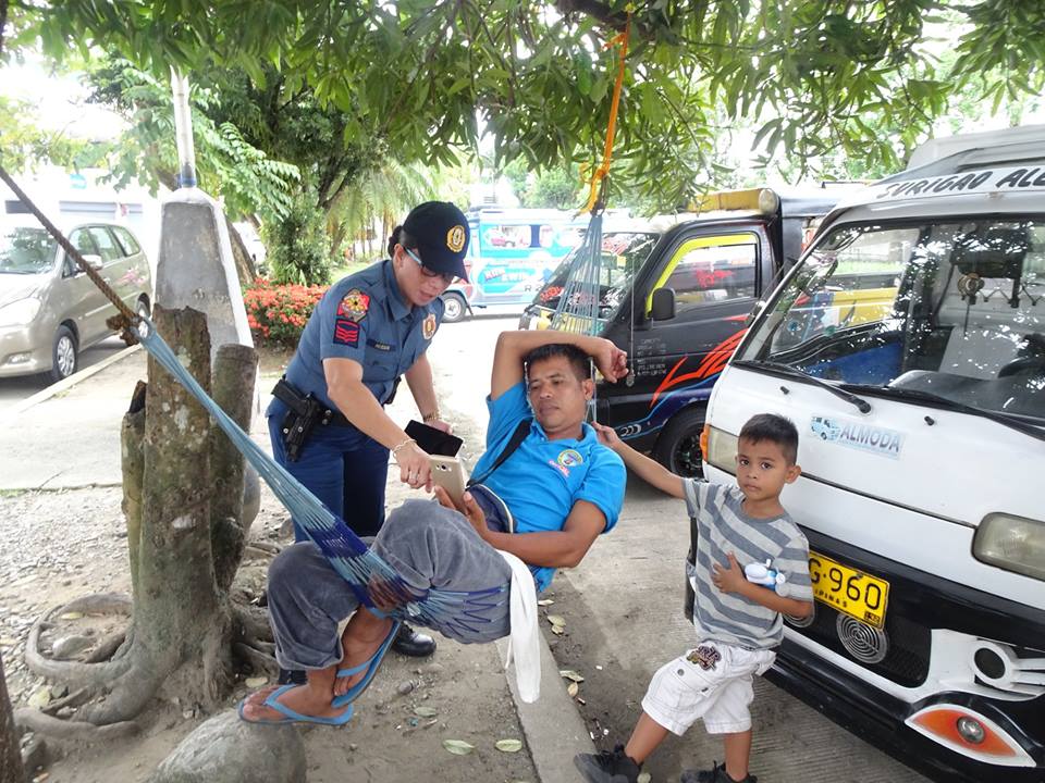 SCPS_PCR's tweet photo. Surigao City PNP personnel conducts PNP Satisfaction Survey at Barangay Luna, Surigao City with respondents from transport sector, vendors, terminal and barangay workers.
#PNPPatrolPlan2030 https://t.co/b244IZT4dd