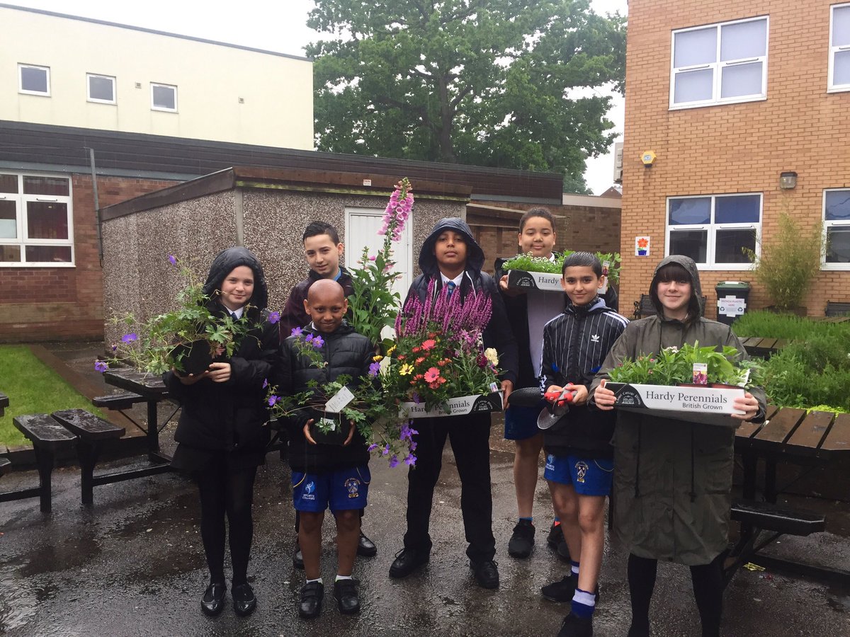 educating_eco's tweet photo. The rain didn't stop us planting. Great work year 7. @BishopChalloner #bcservice #greenspaces #gardening #greenlearning @EcoSchools https://t.co/LLgJkcj6yt