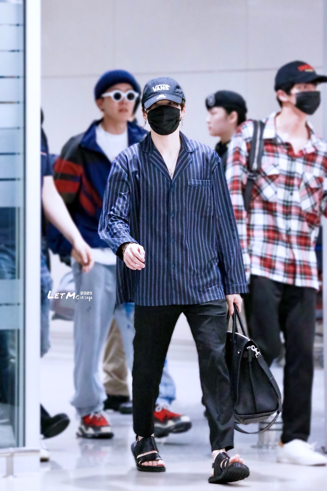 In Photos: BTS Suga's best airport fashion outfits