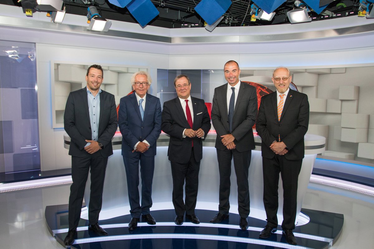 rtlgroup's tweet photo. At RTL Télé Lëtzebuerg studio: CEO of RTL Luxembourg @chgoossens, Minister Dr. Holthoff-Pförtner, @NRWpunktDE Prime Minister @ArminLaschet, @RTLGroup CFO Elmar Heggen and German Ambassador @HeinrichKreft https://t.co/QEGnwxRhgE