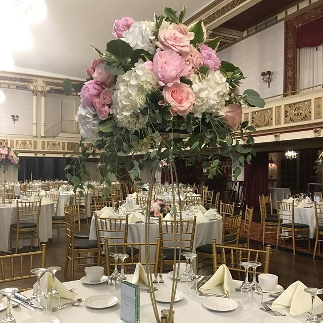 FloralArtBuff's tweet photo. This is a centerpiece from one of our weddings last weekend. We were able to use our locally grown peonies. While we were setting up I couldn’t stop smelling them. The centerpiece was placed on top of our in house built Floral stand. #buffalo #buffalowed… https://t.co/Bl5MYGsRtM https://t.co/ivjXDIdTLk