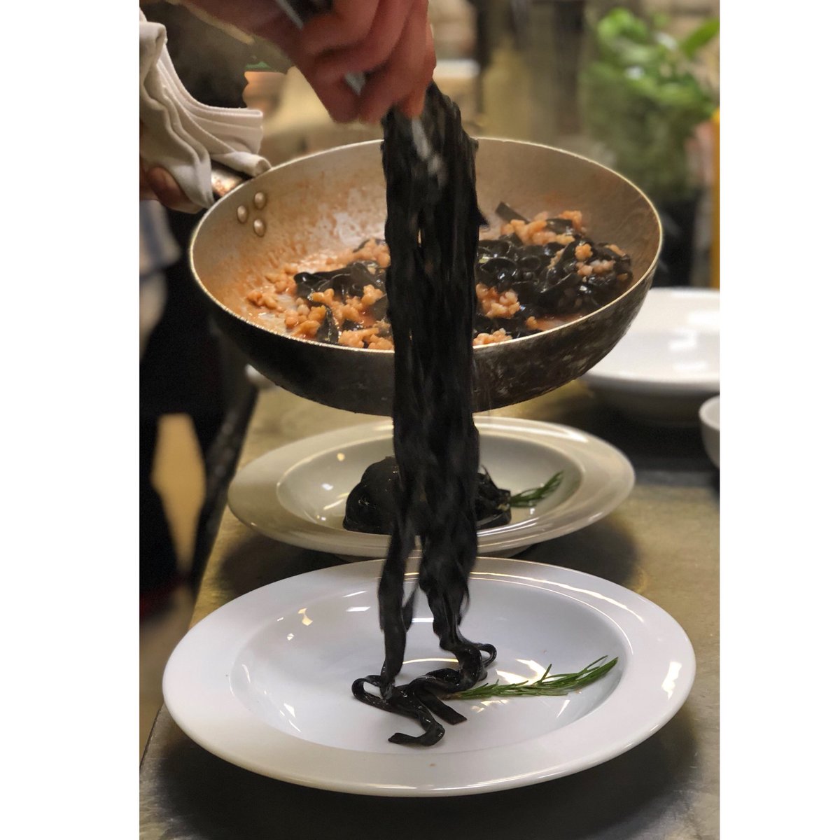 OlivoGroup's tweet photo. Fresh black tagliatelle sautéed with cuttlefish #olivomare #junemenu 💥💥💥💥 https://t.co/Lfbb99pf35