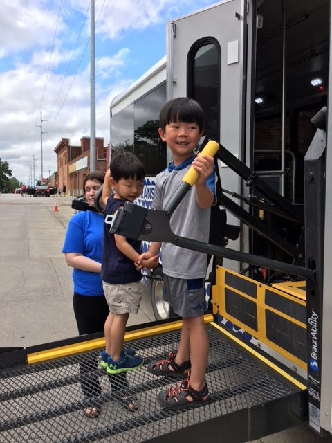 rideHIRTA's tweet photo. The Touch-a-Truck event in Winterset on Saturday was great fun. HIRTA had a bus for the little ones to explore and take a ride on the lift. It's never to early to introduce Public Transit ... #TransitKids #RuralTransitFun #WintersetIowa https://t.co/IxIrAaBT9U