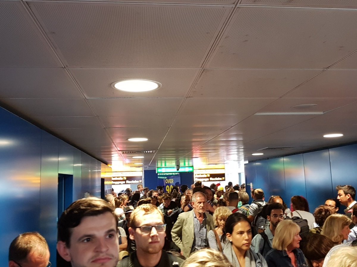 feedregularly's tweet photo. @STN_Airport  potential health and safety hazard incoming as you leave all arriving passengers stuck unable to move to terminal. No train, no coaches, locked doors https://t.co/BMuK2HqK7n
