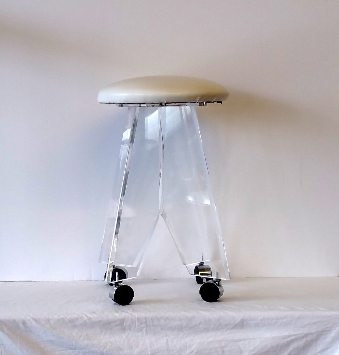 Excited to share the latest addition to my #etsy shop: Tall Lucite Stool on Wheels etsy.me/2JaI5pE #furniture #no #adult #midcenturymodern #mcmfurniture #vogueteam #midcenturystool #lucitebench #lucitestool