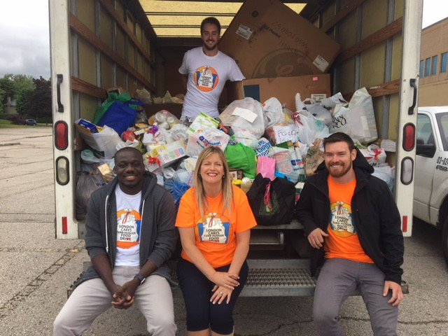 CityofLdnOnt's tweet photo. The #CurbHunger Food Drive team collected donations for @LondonFoodBank1 in Zone A today. If tomorrow is your recycling day, please consider donating curbside beside your Blue Box or at any grocery store or fire station. Thanks to all who have participated  thus far! #Ldnont https://t.co/d9Cf9fhCHg