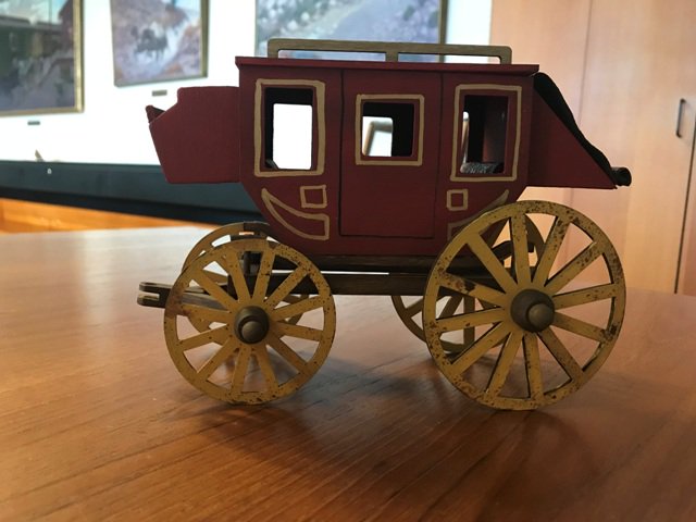 phftucson's tweet photo. It's the beginning of #ExhibitInstallation here at the PHF! Your friendly neighborhood librarian even assembled a model stagecoach for our new display about the unsolved #Wickenburg murders of 1871. More exhibit info coming soon! https://t.co/sDchQiJnx7