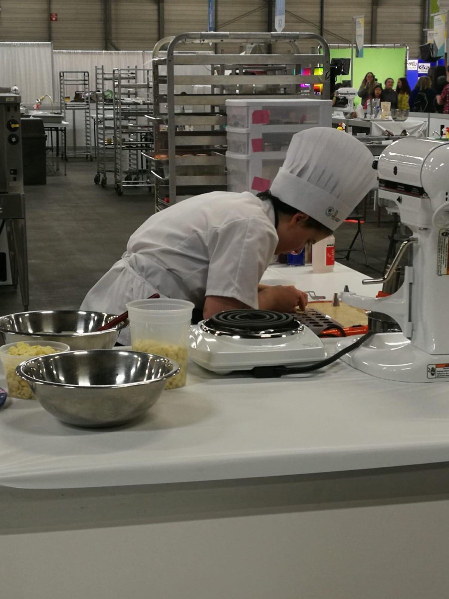 skillsontario's tweet photo. Stefanie from Humber College working hard in the Baking contest at #SCNC2018! 💪 #TeamOntario https://t.co/NdEEcfdP3B
