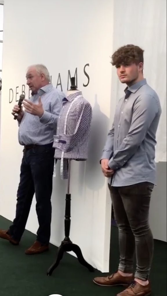 Devils_Edge's tweet photo. Stephen from #DevilsEdge talking about #madetomeasure #bespoke #shirts at #bloom2018 on the #debsinbloom stage today 👍🏼👔🌸🌻 Two Power generations looking #dapper in their DE shirts #father and #son 💙👔💙 #dapper #mensstyle #fashion https://t.co/N9aiDExvhJ