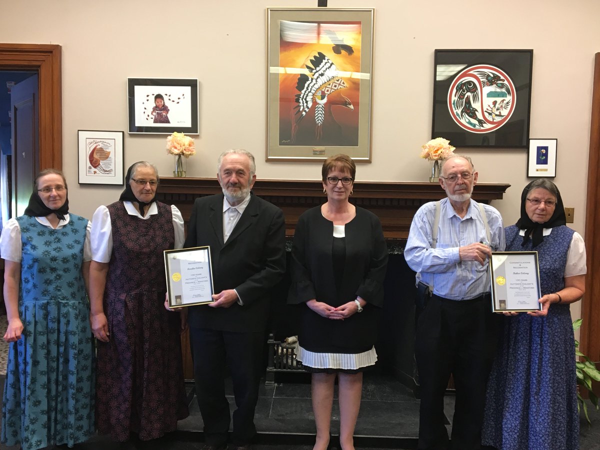 Min_E_Clarke's tweet photo. A big thank you Bishop Arnold Hofer and Reverend Ben Maendel for coming to the Manitoba Legislature for a Member's Statement and meeting with myself and @Brian_Pallister to celebrate the 100th Anniversary of Hutterite Colonies in Manitoba. #mbpoli https://t.co/VrkrmuTKj8