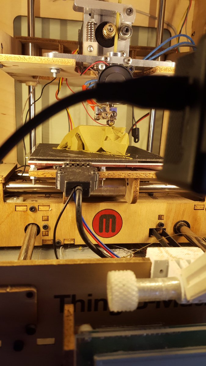 MakeItWithCal's tweet photo. @3DPProfessor low poly dino printing away on the @makerbot #thingomatic in @Proto_pasta HTPLA brass. https://t.co/t8HCwjAO6t