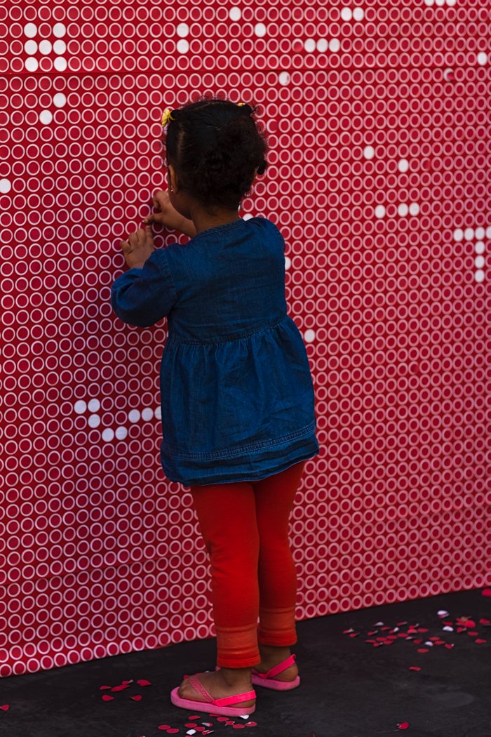 The early part of my afternoon was touring the #100in1Day for @EGBrickWorks Installations. My shift was quieter but I loved this photo of the girl focused on her task at #urbanflux