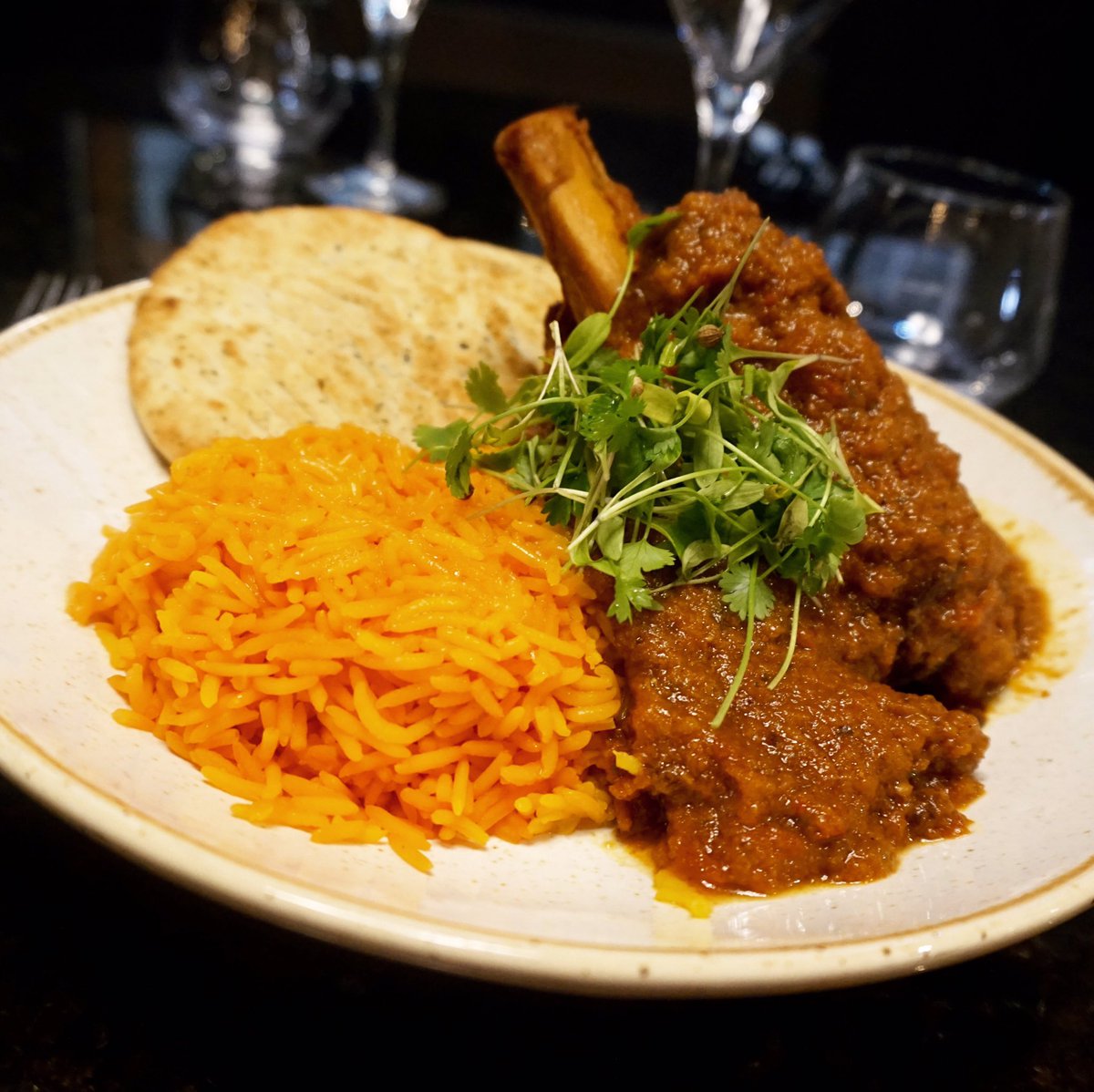 Slow cooked lamb shank, Balti spices, cardamom basmati rice, garlic and coriander naan #SwanStafford #Stafford #WDYT