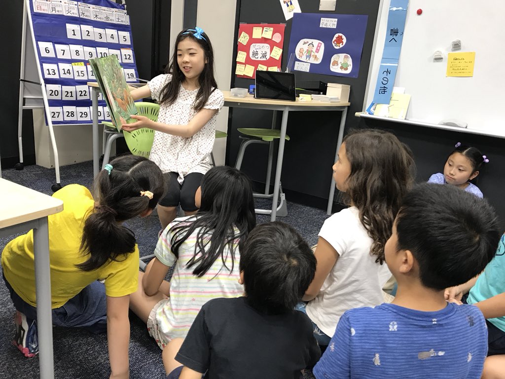 asijJessee's tweet photo. #G3JPClass volunteered to help out with read aloud today and the rest of the group enjoyed listening.  It may not be so bad that a teacher loses voice.  Thank you, girls! https://t.co/lMyUQUOgli