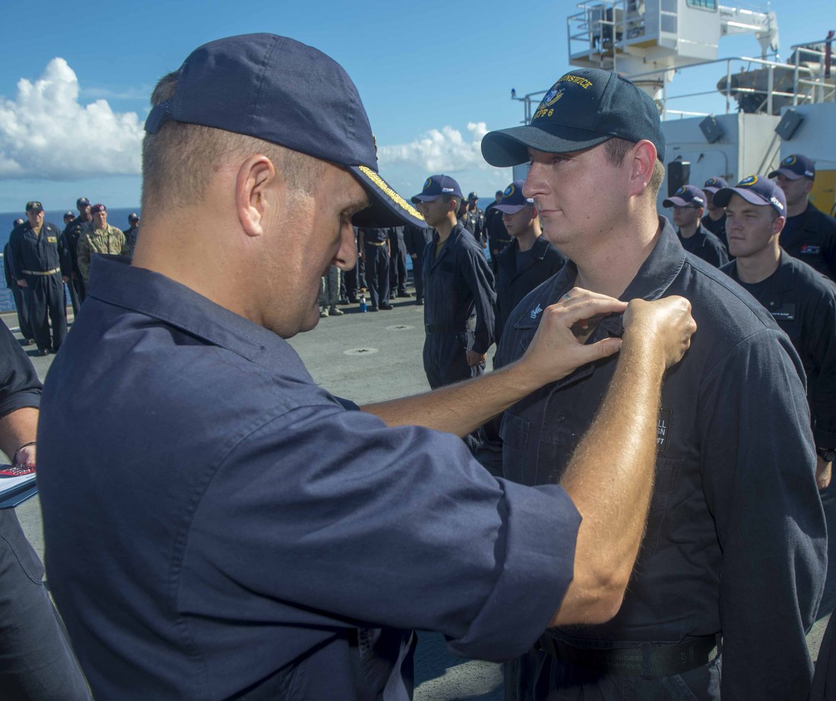 CaptPeterOlive's tweet photo. A great honour to ‘frock up’ Petty Officer Hall – a SeaBee - who was part of our mission team in USNS BRUSNWICK.  He did a great job in Yap, Palau and Tawau and it was a real privilege to share the moment with him. https://t.co/kLzBwIHqVA