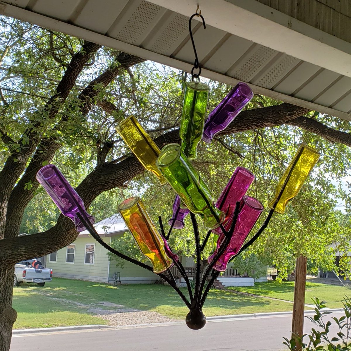 I can't remember if I tweeted this but let's face it, this hanging bottle tree is totally awesome. #bottletree