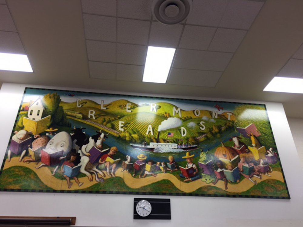 buildprc's tweet photo. Here's a heartwarming story to start off your day! Inspired by her former elementary school librarian, PRC family-member Nancy Kreider envisioned a mural to inspire future generations. https://t.co/k3NInKMDno
