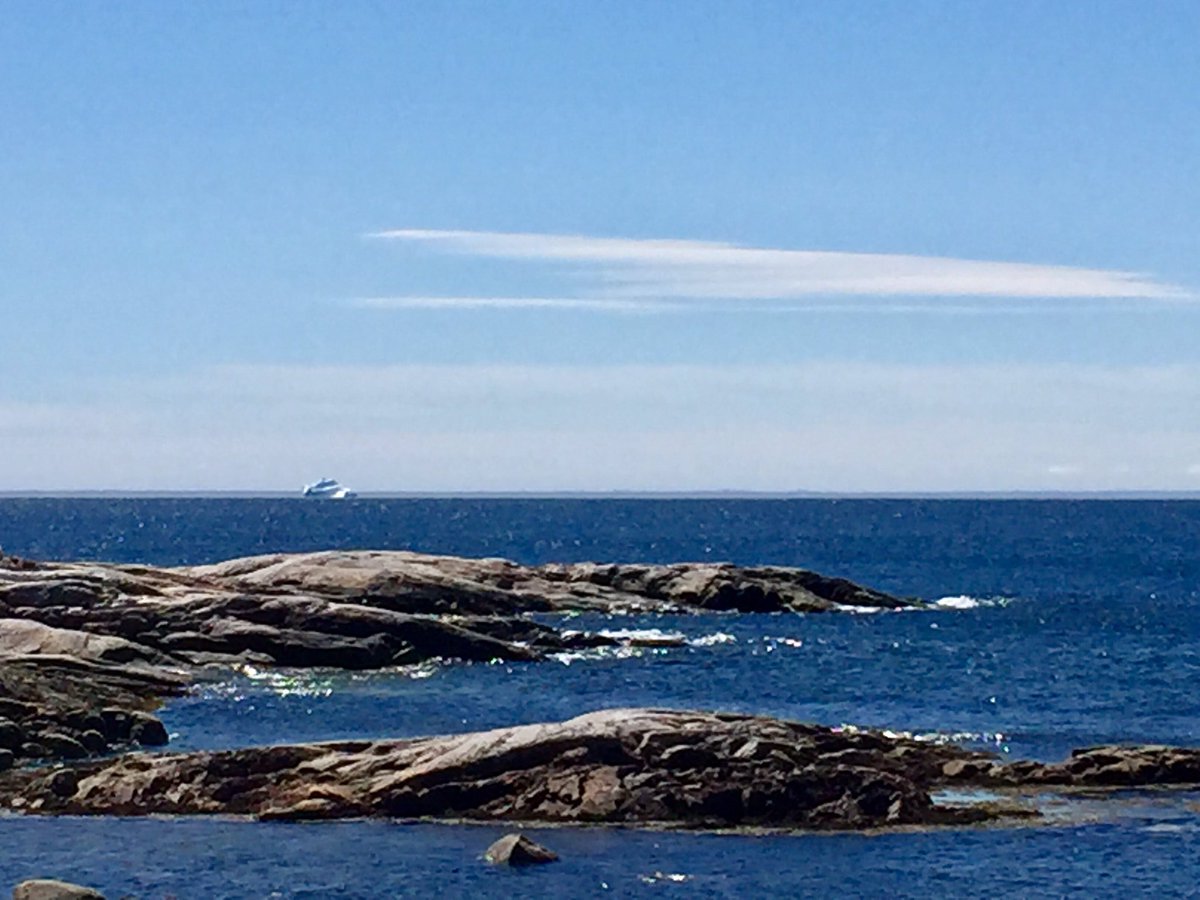 LabradorStraits's tweet photo. It's closer than it looks, I promise!  Check it out, a berg floating through the Strait near Capstan Island today.  They can't hog them all for the @TheIcebergFest ;)  #ExploreNL https://t.co/2pGsIHR4B0