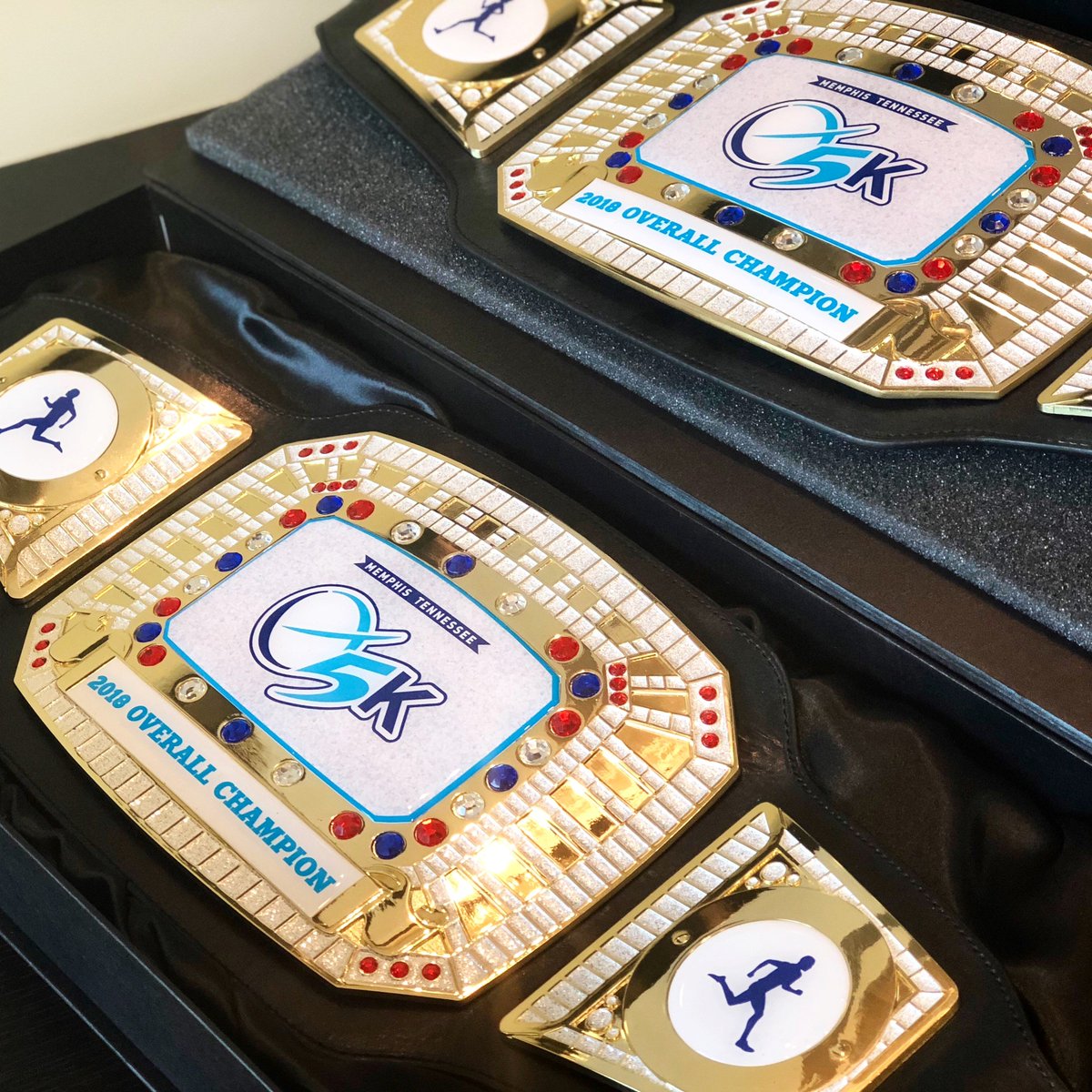 theorionfin's tweet photo. WOW π take a look at these beauties. The first place finishers for the men's and women's divisions of our inaugural #Orion5K will walk away with our first ever Orion 5K Championship belts! Who's ready to race? See you at the starting line this Saturday at 7pm. @Orion_5K https://t.co/wgqPV6LGwA