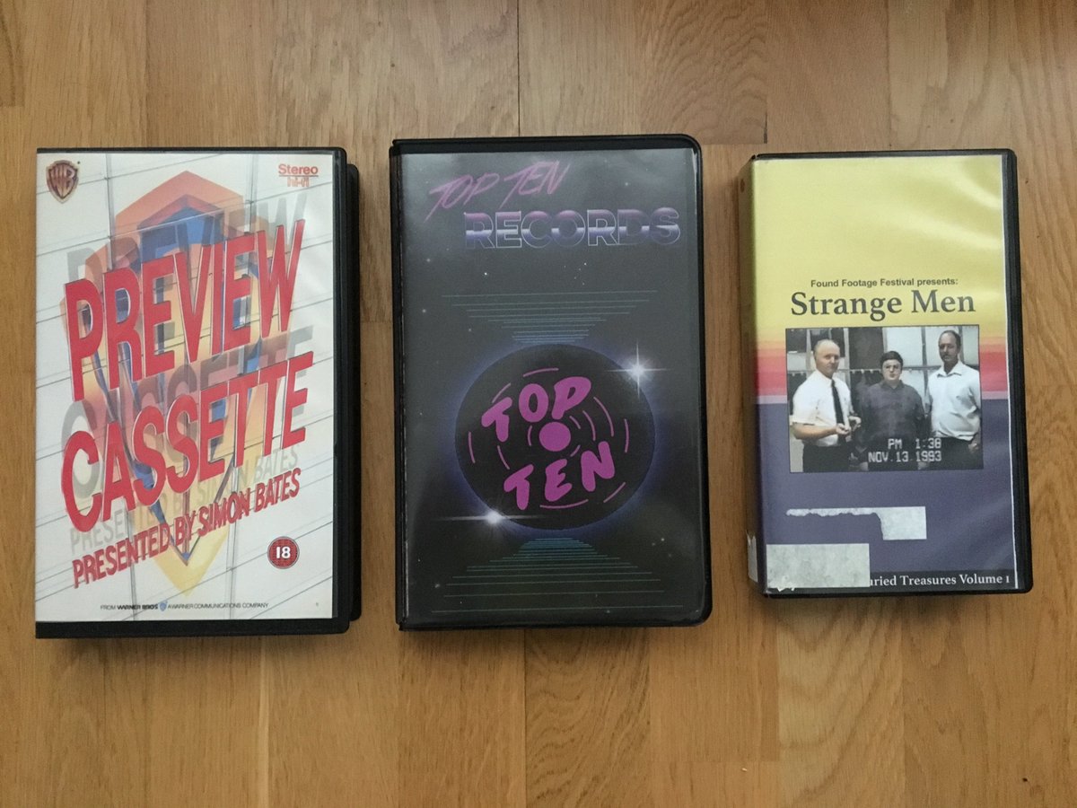 TheDukeMitchell's tweet photo. Three VHS oddities we checked out briefly at the #DukeFest launch, a rare #WarnerBros 1980s dealer tape, a sadly blank tape from @toptenrecords and a quick blast of @foundfootage and their #StrangeMen compilation! Join us at #DukeFest in July for even more! https://t.co/WG0vYwNQ4S