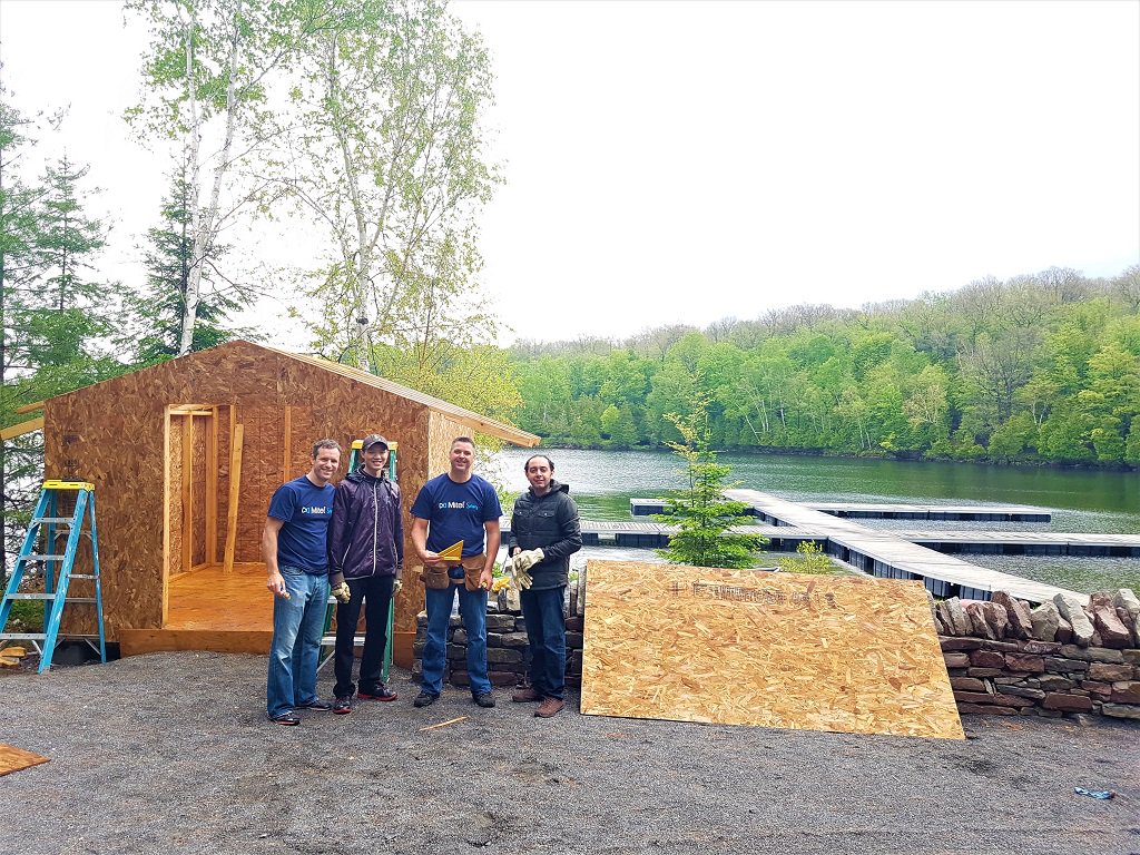Mitel's tweet photo. The Kanata team kicked-off Mitel's Global Day of Service (June 8) a few days early @ChristieLake! 100+ volunteers spent the day getting camp ready for the children's arrival. To learn more about Christie Lake Kids click here > https://t.co/y9W0ZHbiyu #MitelServes https://t.co/B0Soxm92NT