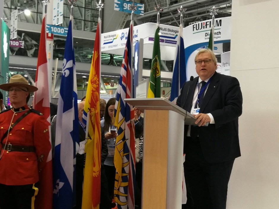 QuebecBoston's tweet photo. .@drgbarrette speaking at the opening of the 🇨🇦 pavilion @BIOConvention "We are all together for #BIO2018!" #partners #lifesciences #QcBIO2018 #Booth751 @economie_quebec https://t.co/tk1IJsKA9P