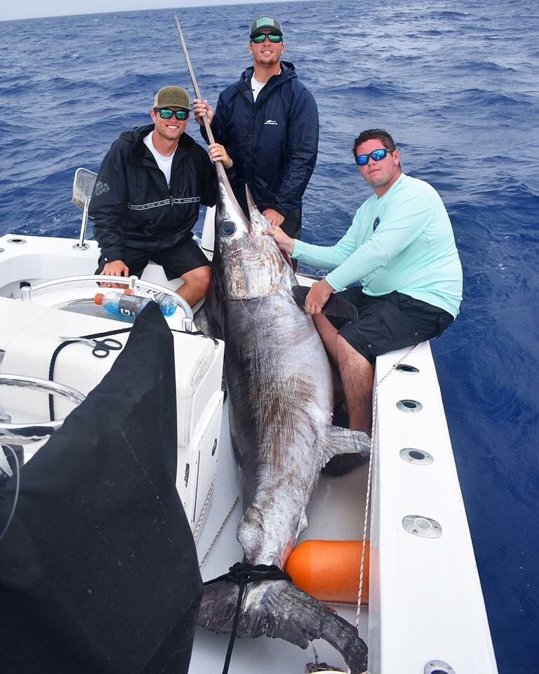 This 385-LB. #Swordfish was hauled in by Kenny Rasberry. His team included Ryan McKay, Ryan Kalili and photographer Jack Shealy. The guys connected with the #Fish off Government Cut. Click bit.ly/2M19Uig to see the full report on this epic catch! #Florida #ThisIsFishing