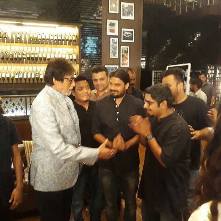 SrBachchanclub's tweet photo. T 127 - Pics Update.. . there is music .. a band plays introduction.. they are the Kabir Cafe .. a bunch of enthusiastic musicians dressed in black and only play Kabir Dohas .. credible and very unique . #StarryNight2 @SrBachchan https://t.co/UAKFT4ftlr