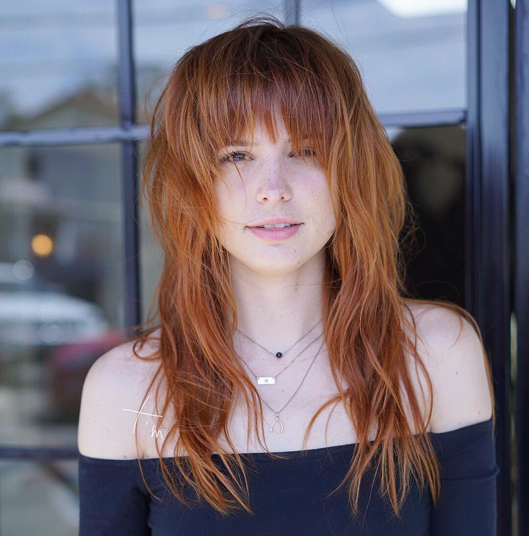 Image of Messy textured shag with bangs for long face