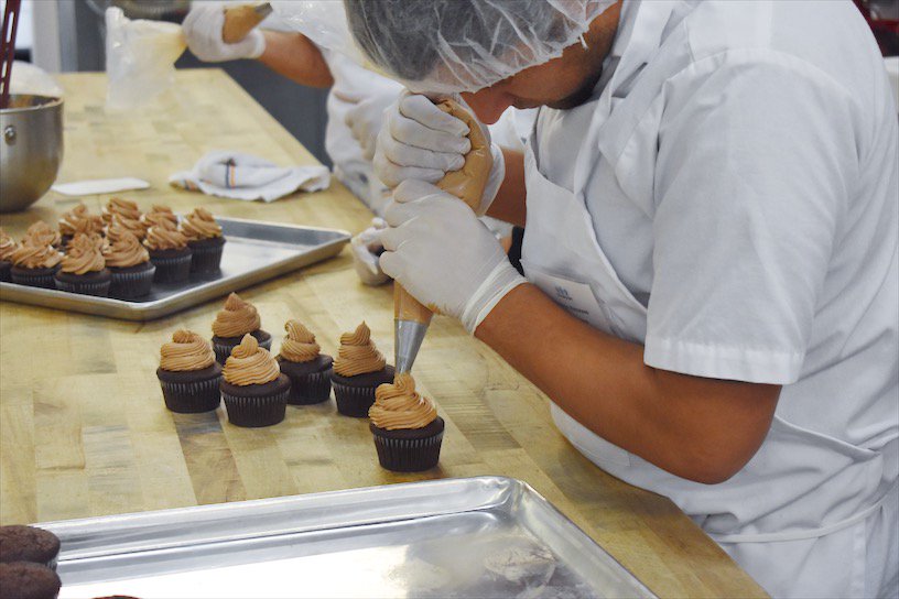 BreadProject's tweet image. It’s day one of our Bakery Bootcamp training program! Over the next 3 weeks our participants will be engaging in a variety of activities from cupcake preparation to goal setting to mock interviews. We will be sharing an inside look of our Bakery Bootcamp— be sure to follow along!