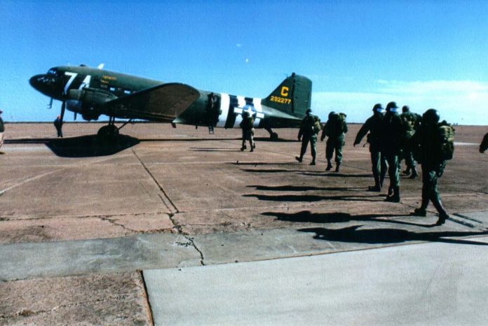 OklahomaMag's tweet photo. Oklahoma’s WWII Airborne Demonstration Team keeps paratroopers’ history alive in Frederick. https://t.co/f0fpKiiHRe #Oklahoma #Federick https://t.co/e3vdt4S54a