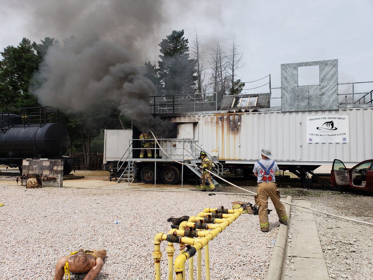 BryanOrmond's tweet photo. Big thanks to the Raleigh Fire Department for letting us come out and watch the live burn training today. Nothing like getting out of the lab to give the students perspective on their research. @NCStateTextiles #TPACC https://t.co/U26PafGsIa