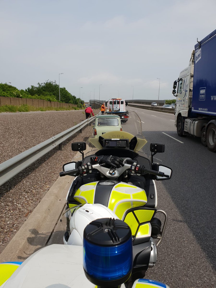 GardaTraffic's tweet photo. Vintage car broke down on South Ring Road in Cork. Elderly driver standing behind crash barrier when Gardai arrived. Driver said he remembered the @RSAIreland Ads about what to do. Recovery vehicle attended &amp; brought car &amp; driver to destination. #SafetyFirst #TuesdayThoughts https://t.co/IrD7A5Dsww