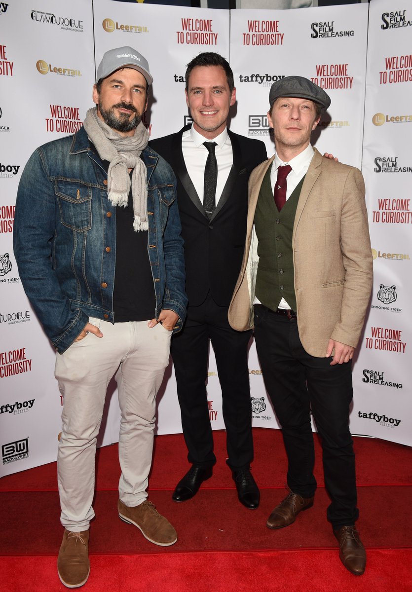 CuriosityMovie's tweet photo. Actors @GaryGrant0709 and @criSolimeno, who play Tim and Dexter, with director @BenPickeringUK on the red carpet for last night’s UK #premiere of #welcometocuriosity #indiefilm https://t.co/lPARJUauZE