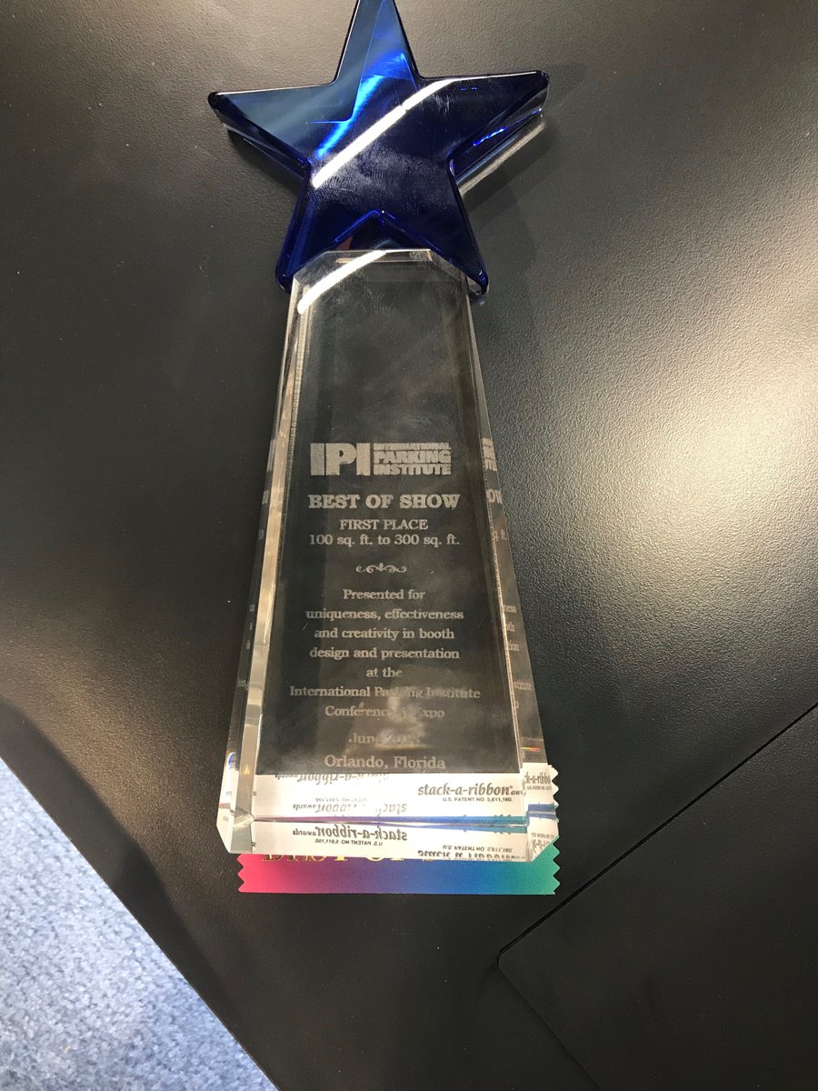 genetec's tweet photo. WINNING! The @genetec team are thrilled to have won #BestInShow for our Booth (#1701) at @IPIparking Conference & Expo today in #Orlando. #AutoVu for #ParkingEnforcement offers many beneficial applications. Visit our winning booth to learn more. #IPI2018. https://t.co/k7dzoUiH0B https://t.co/I1zgYDHBVX