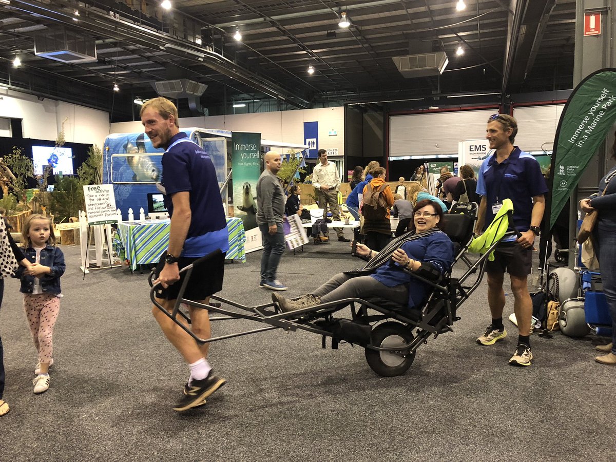 intheflinders's tweet photo. Showing off the Trail Rider wheelchair at the World Environment Fair. Thanks @SAEnvirWater for letting us partner with you! Catch us at the @yumigo_running Cleland 50 Ultra marathon this weekend to see what the chair is really capable of. #trailrider #cleland #intheflinders https://t.co/2kTYht3Y2G