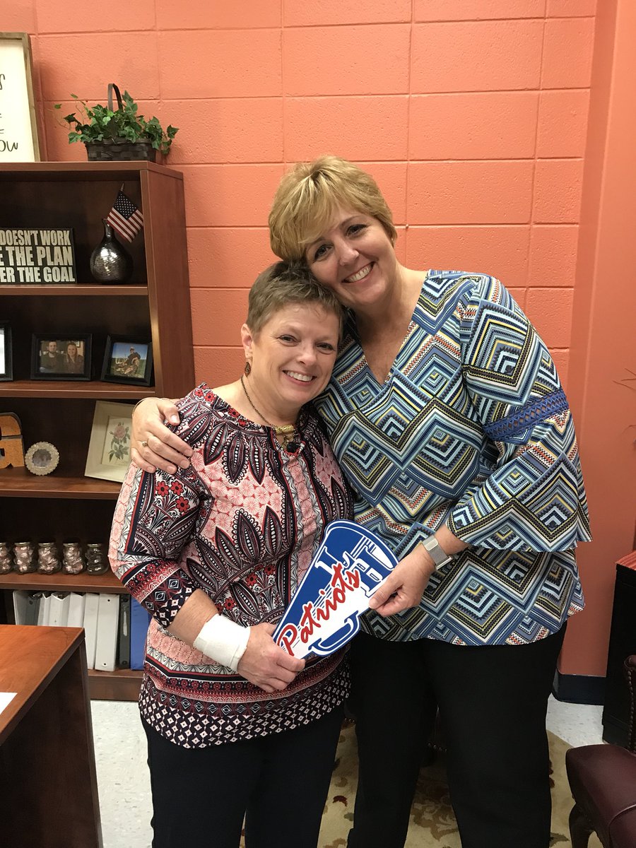 Passing the torch - Dr. Dalton, who will be moving to the position of Federal Programs Supervisor at Central Office, passes the torch to Mrs. Shelley Green, Lincoln Heights Elementary’s new principal! Congratulations, Mrs. Green! <a href="/janetddalton/">Janet Dalton</a>