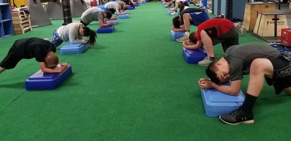 JeremyFrisch's tweet photo. They're too young to know how important this is. Sitting in class for the better part of the day isn't doing their bodies any favors both in performance and joint health.They do know that they feel better and moving around feels a whole lot easier. So we do it everday. #Mobility https://t.co/S4mBiyw0yn