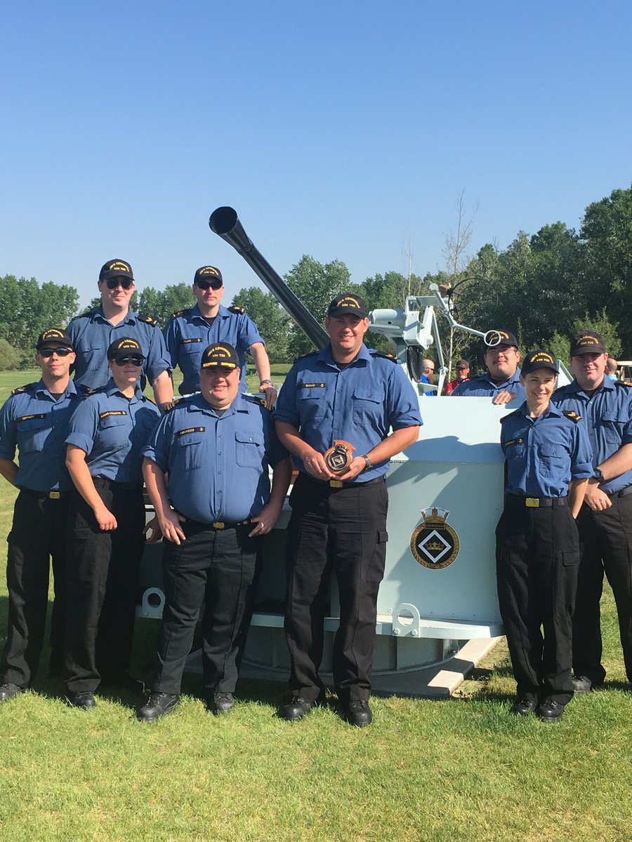 HMCS Edmonton gets a picture with her old 40mm gun, now part of the Garrison Memorial Golf Course at CFB Edmonton.