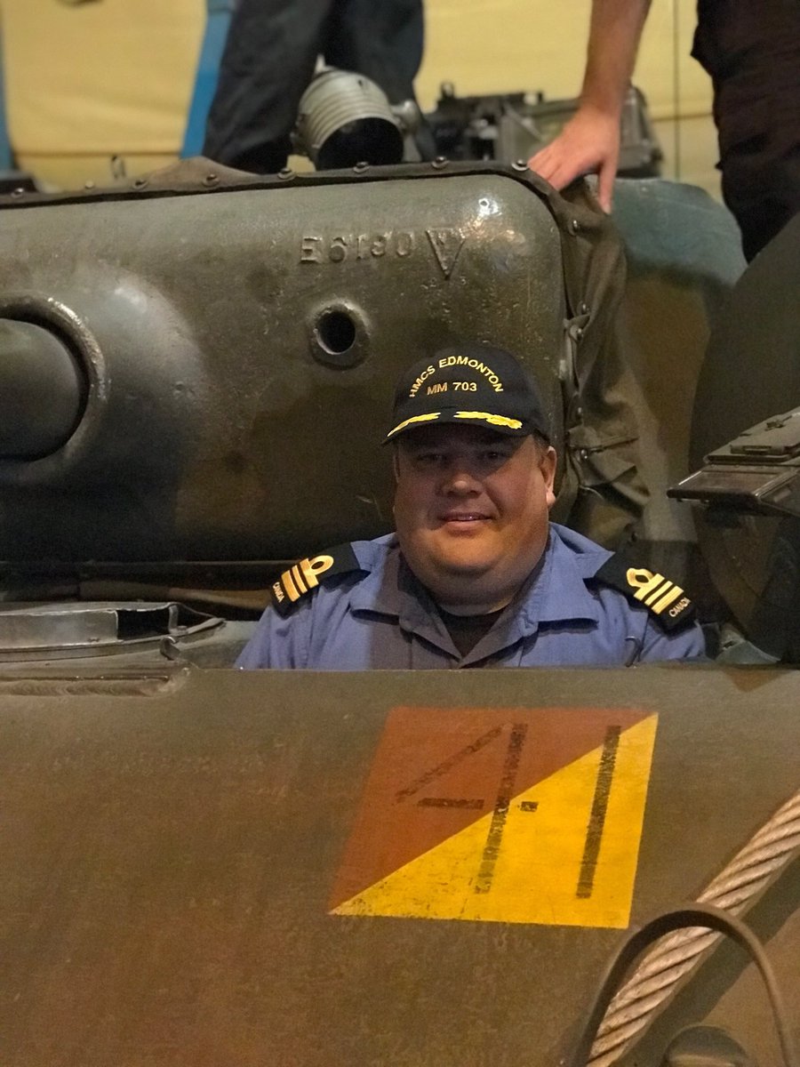 CO HMCS Edmonton, LCdr Brian Henwood, looks pretty sure he can park a WWII Sherman tank as well as a ship.   Checking out the Historical tanks at the Strathconas.
