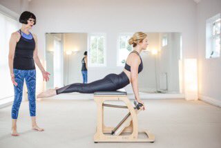 Swan-dive, great for strengthening the glutes and good posture #funonthechair #superstrong #givepilatesago @hollythrower