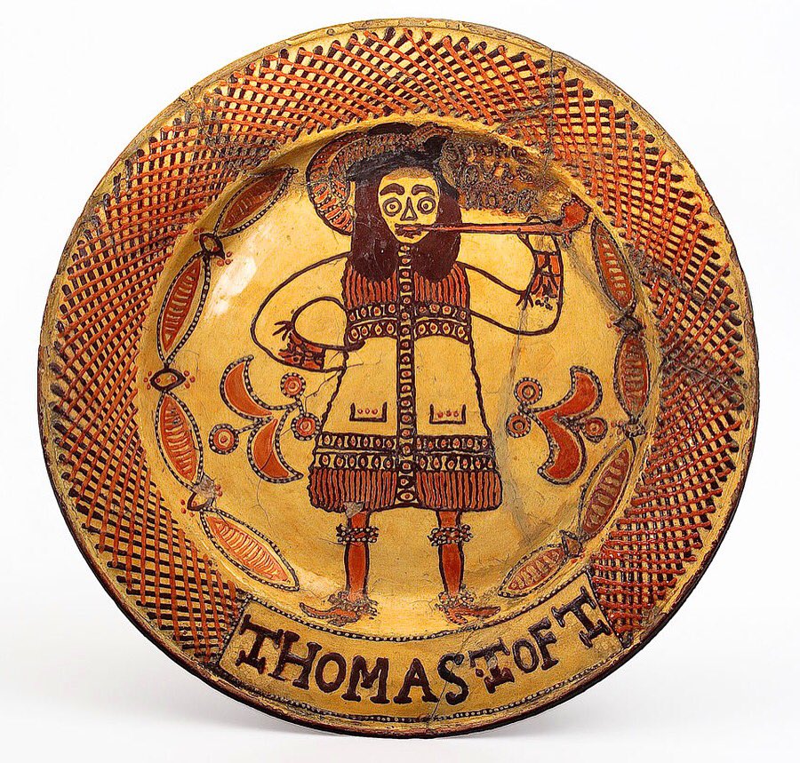 AntiquesMag's tweet photo. #antiqueoftheday Thomas Toft, Slipware dish showing a pipe-smoking cavalier. 17th c. Staffordshire. @PotteriesMuseum, Stoke-on-Trent. #slipware #thomastoft #staffordshire https://t.co/y955khpqDZ