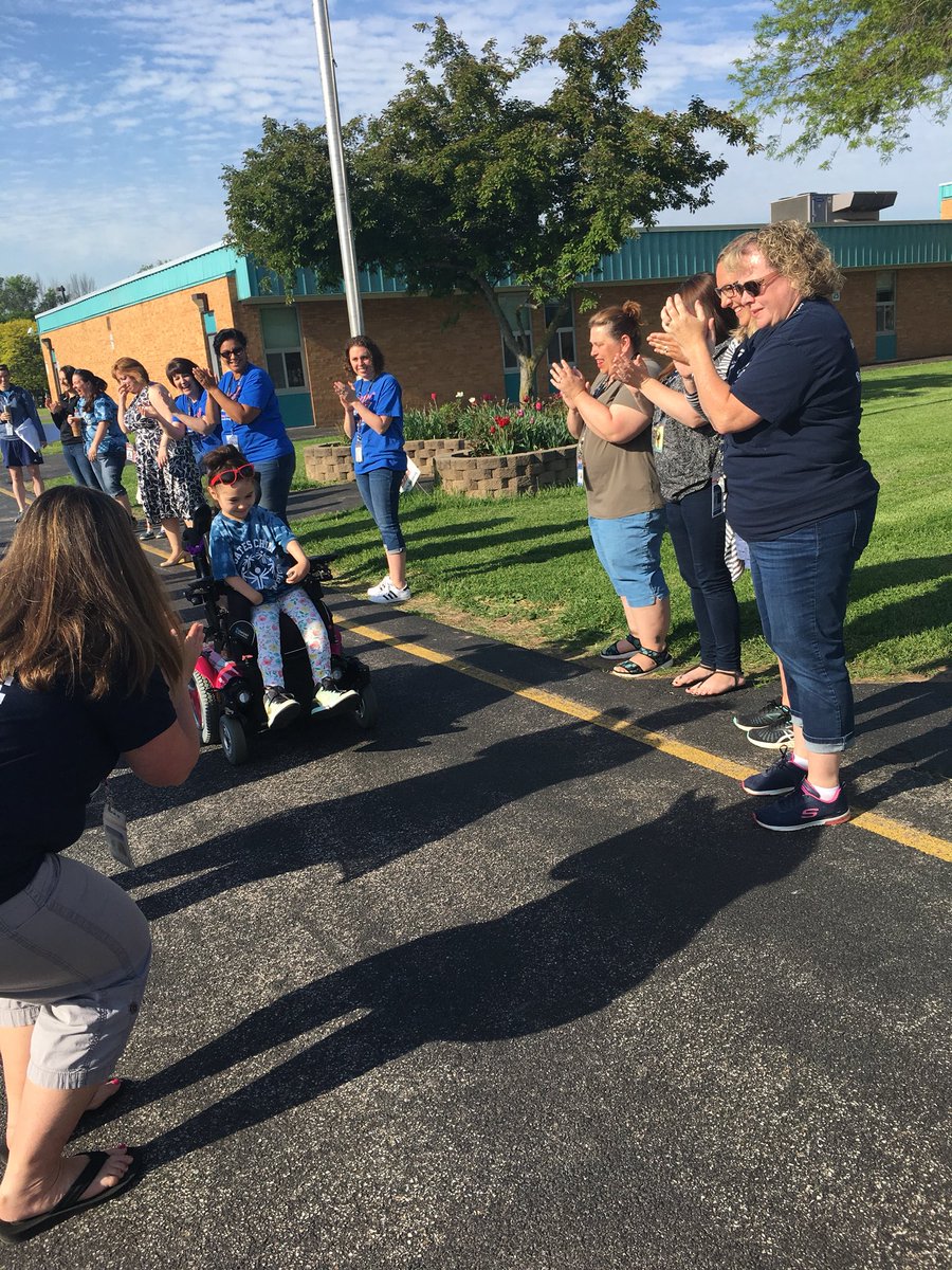 gcwaltdisney's tweet photo. A fun start to the morning - The Walt Disney Staff was proud to cheer on our very own Ella, on her way to represent the Dragons at the Special Olympics #wds50 https://t.co/opukzeSsak
