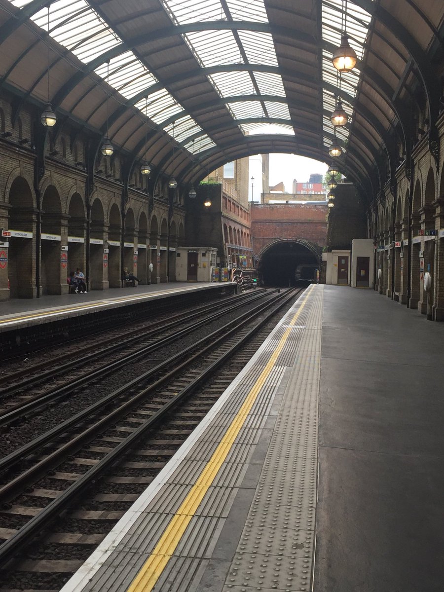 rosiesthinking's tweet photo. I never stop being enchanted by the everyday engineering that makes @TfL work. The classic architecture at #NottinghillGate is no exception. #Infrastructure #EverydaySpaces #AlwaysLookUp https://t.co/Vxgd33KmWW