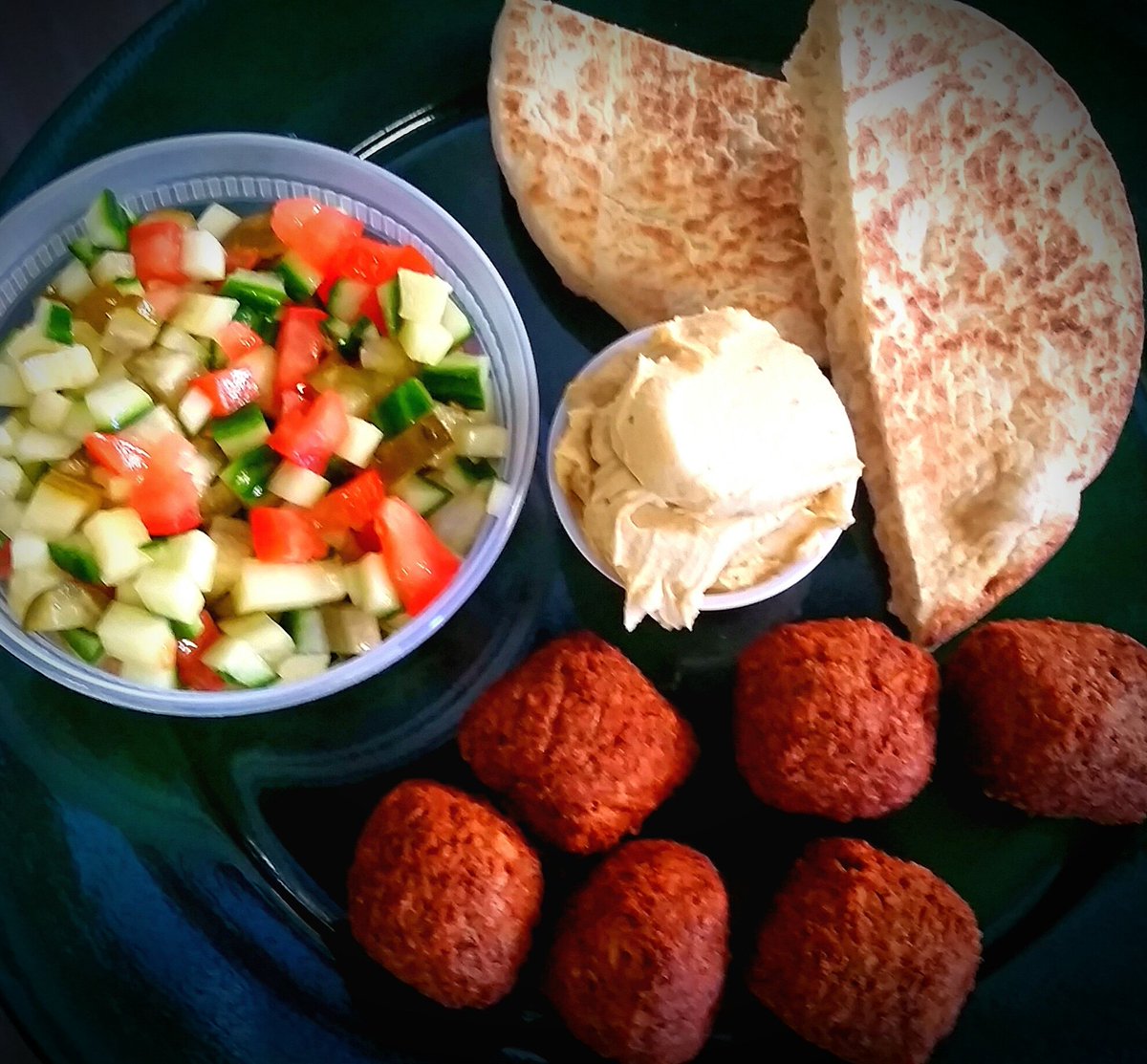 Falafel platter! Comes with falafel, a fresh israeli salad, Hummus, and pita bread.
#vegan #healthy #israelistyle #kosher #KosherinDesMoines #kosheriniowa #kosherdeli #Falafel #israel #hummus #beamaccabee