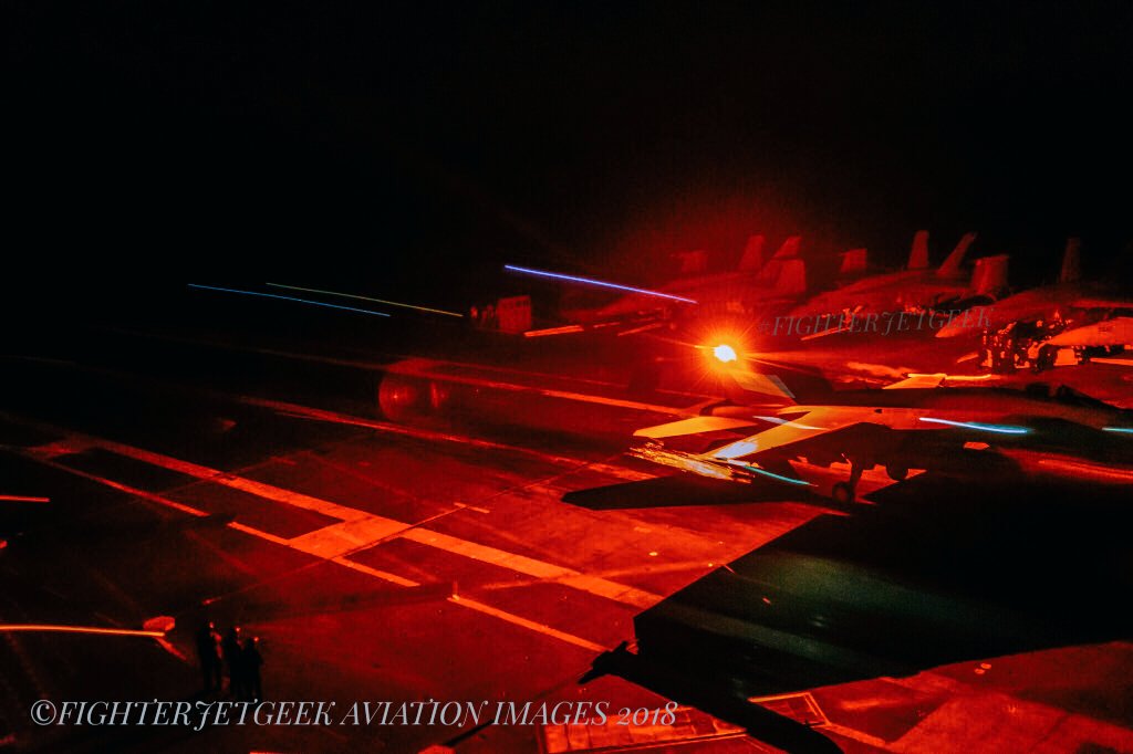 Anti-collision strobes flash on a F/A-18E Super Hornet from the #Warhawks of #VFA97 recovering to #CVN74. The ship was conducting training operations somewhere in the Pacific Ocean 21 May 2018. #LookAhead  #TeamShogun #NavAir #NightPhotography #NikonD500 #FighterJetGeek