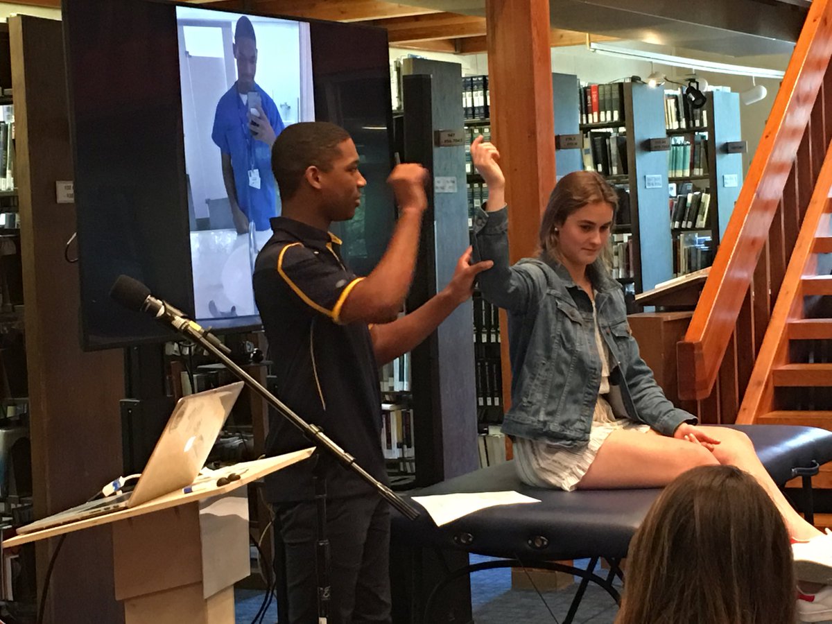 PennCharterLibs's tweet photo. Nasir demonstrates his new sports injury knowledge gained during his senior project with assist from Greer. #pcproud https://t.co/8EGH7NJuEL